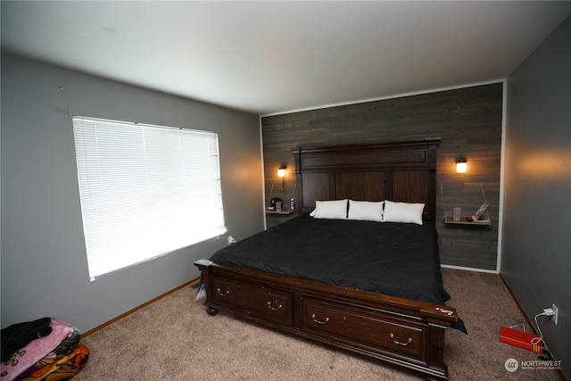 carpeted bedroom with wood walls and billiards