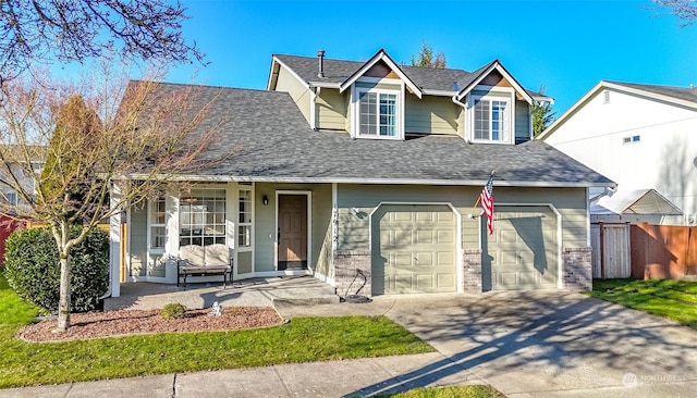 view of front of property featuring a garage