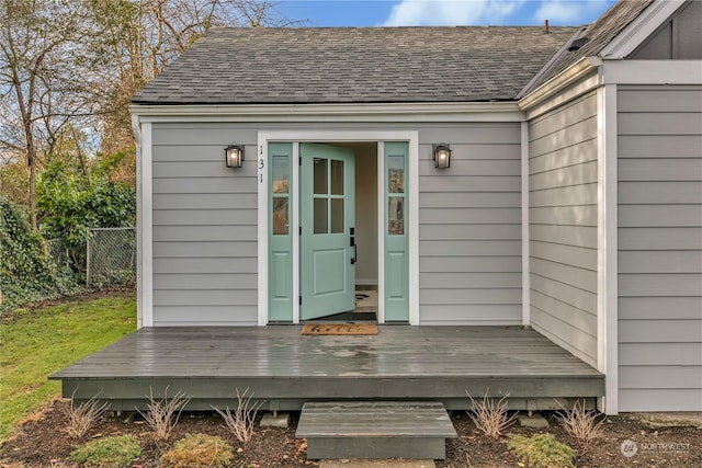 property entrance with a deck