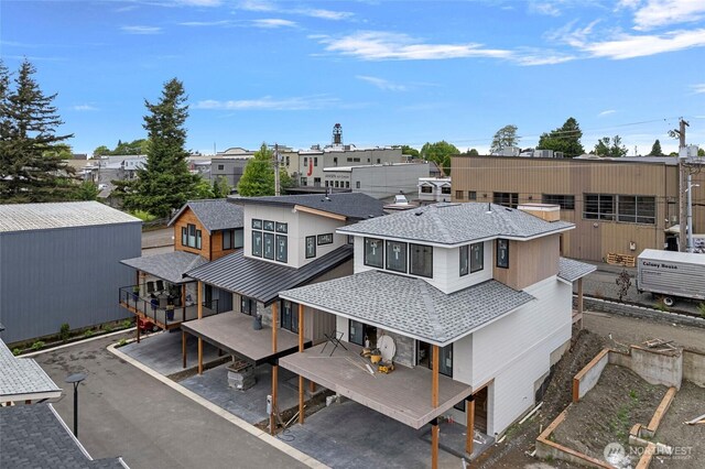 104 Riverwalk Dr, Lynden, WA 98264 - back of property featuring a residential view and a shingled roof