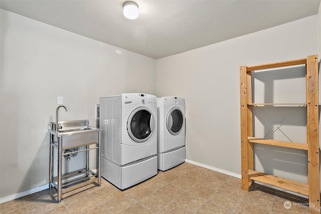 laundry area with washing machine and dryer