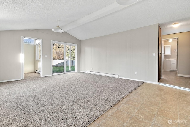 spare room with a textured ceiling, a baseboard radiator, and vaulted ceiling