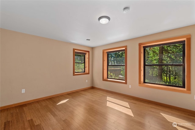 empty room featuring light hardwood / wood-style floors