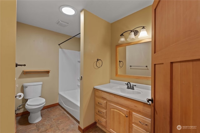 full bathroom with vanity, shower / bath combination, and toilet