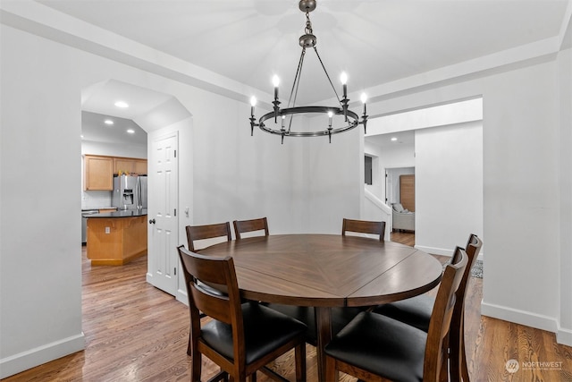 dining space with light wood-type flooring