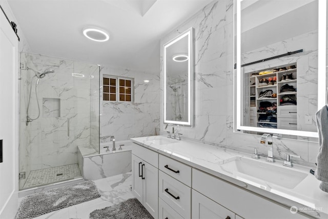 bathroom featuring vanity, tile walls, and walk in shower