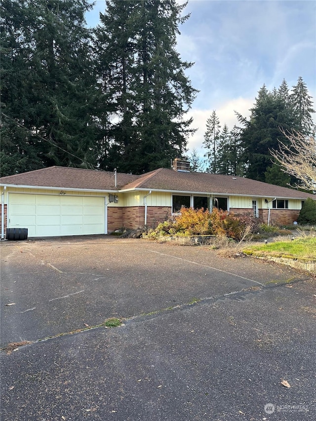 ranch-style home with a garage