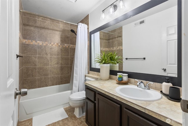 full bathroom with shower / tub combo, vanity, and toilet