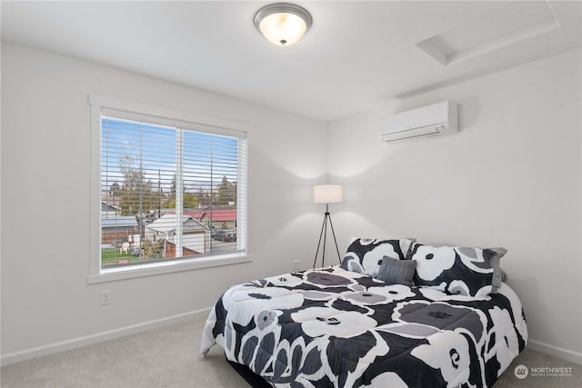 bedroom featuring carpet and an AC wall unit