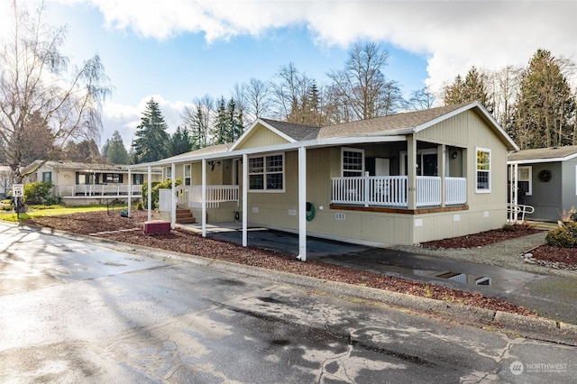 view of front of home featuring covered porch