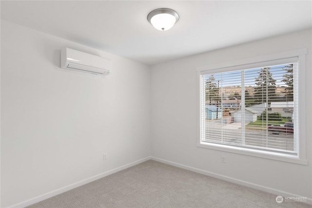 empty room with carpet flooring and a wall mounted air conditioner