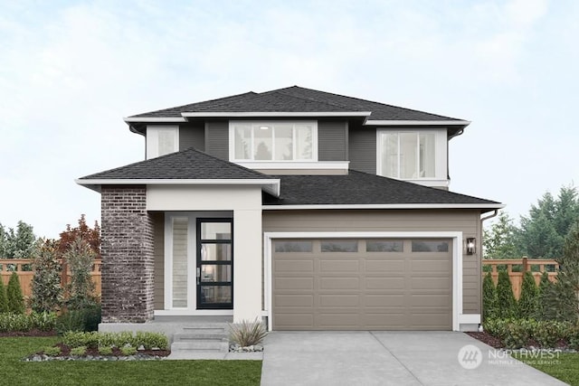 prairie-style house with a front lawn and a garage