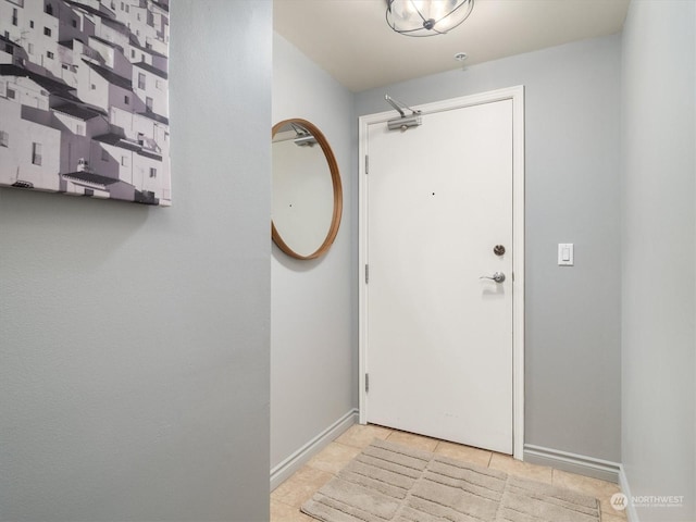 view of tiled foyer entrance