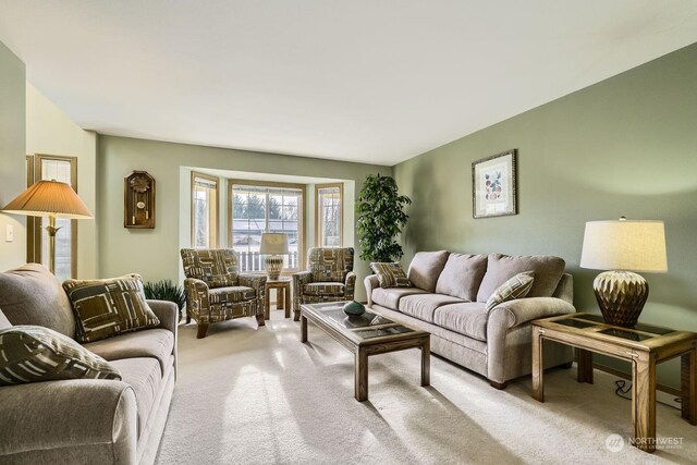 living room with light colored carpet