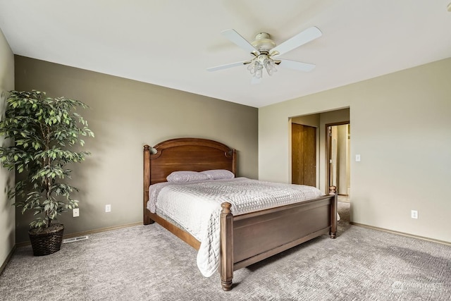 carpeted bedroom featuring ceiling fan