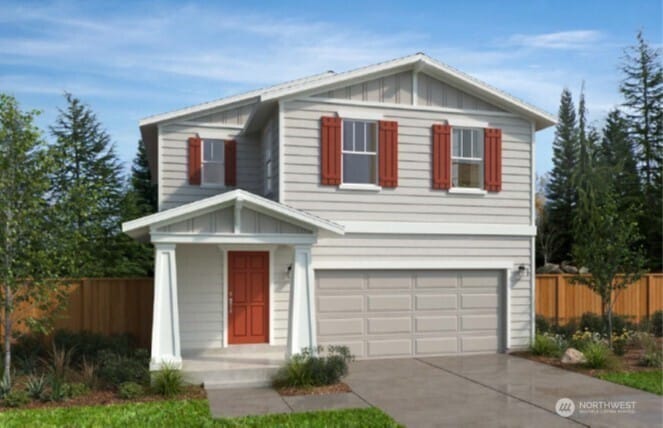 1447 121st Ave SE Unit 9, Lake Stevens, WA 98258 - traditional home with a garage, driveway, and board and batten siding