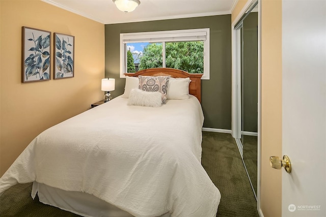 bedroom featuring ornamental molding, a closet, and carpet flooring