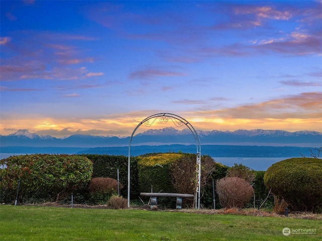 mountain view with a water view