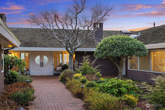 exterior entry at dusk with solar panels