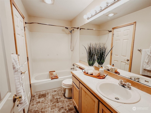 full bathroom featuring vanity,  shower combination, and toilet