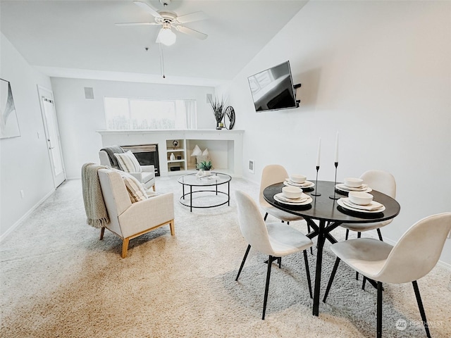 dining room featuring vaulted ceiling and ceiling fan