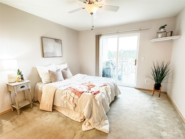 carpeted bedroom with ceiling fan and access to outside