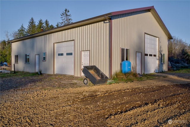 view of outbuilding featuring a garage