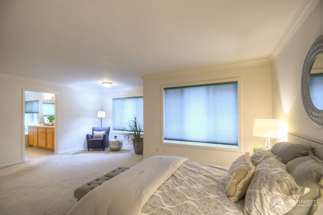 bedroom with ensuite bathroom, crown molding, and light carpet