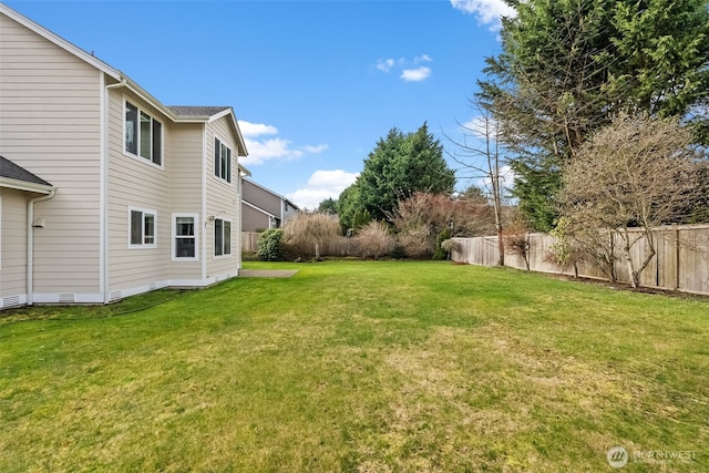 view of yard featuring a fenced backyard