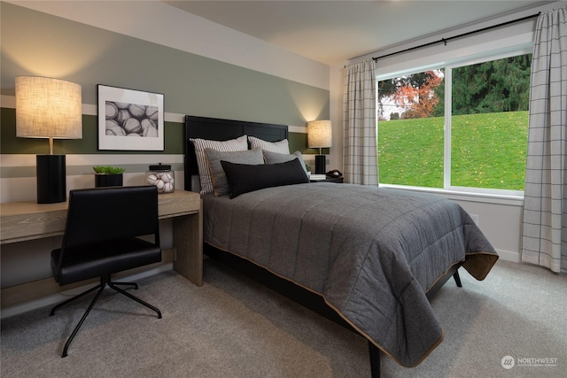 bedroom featuring light colored carpet