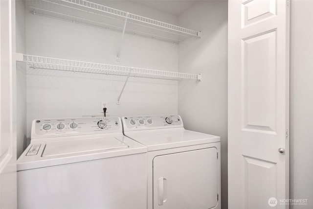 laundry room with laundry area and separate washer and dryer