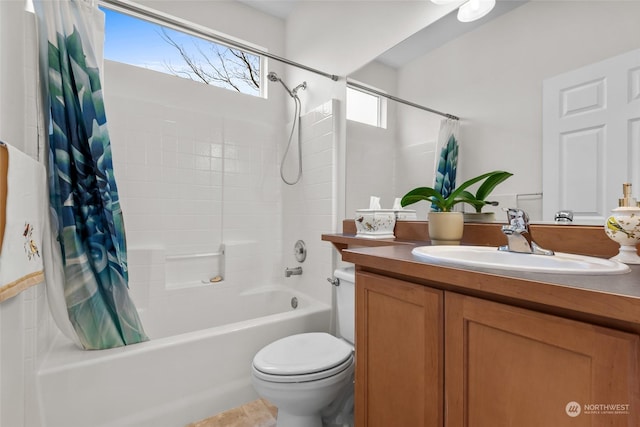 full bathroom with toilet, vanity, and shower / bathtub combination with curtain