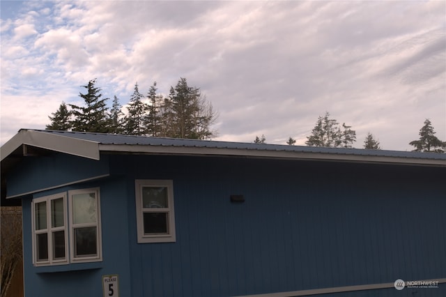 view of property exterior at dusk