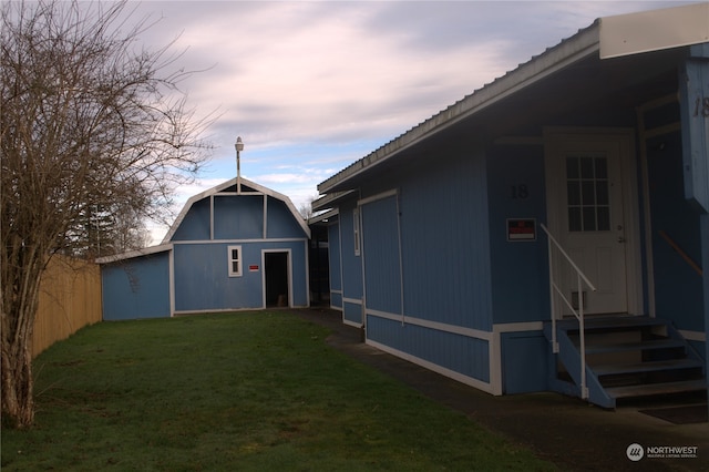 yard at dusk with an outdoor structure