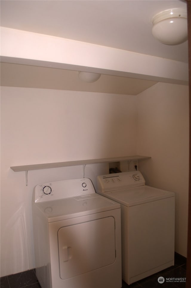 laundry room with separate washer and dryer