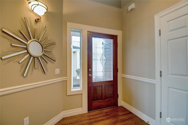 foyer entrance featuring dark hardwood / wood-style flooring