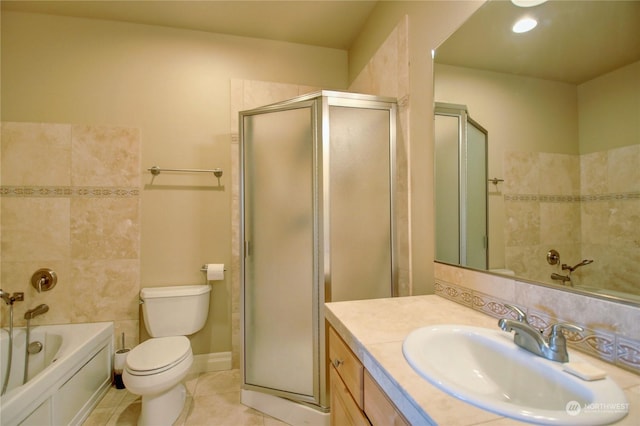 full bathroom with tile patterned floors, vanity, toilet, and shower with separate bathtub