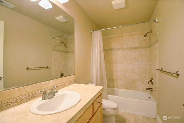 full bathroom featuring vanity, shower / tub combo with curtain, tile patterned flooring, toilet, and tasteful backsplash