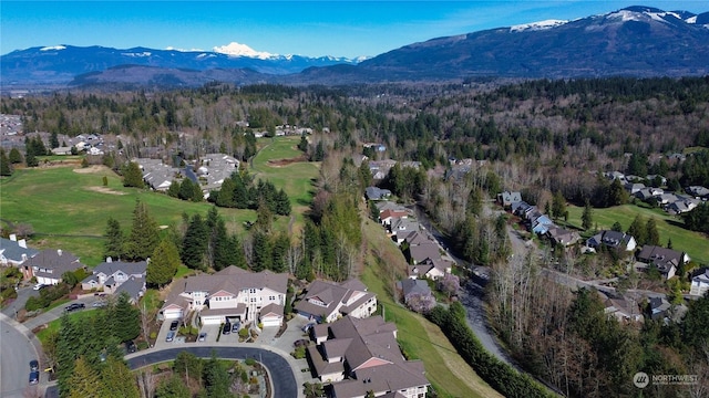 drone / aerial view featuring a mountain view