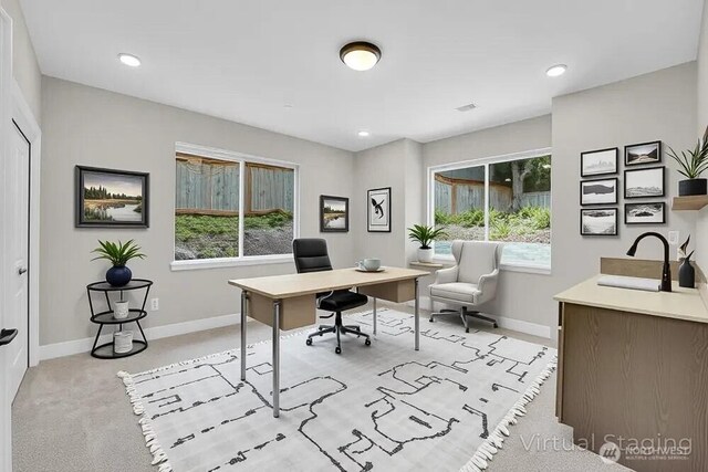 office space with a sink, baseboards, and recessed lighting