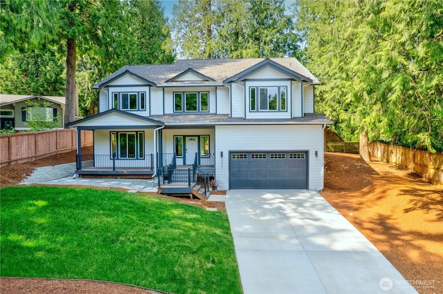 1827 216th Pl NE, Sammamish, WA 98074 - view of front of property with an attached garage, a porch, driveway, and a shingled roof