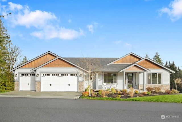 craftsman-style home with a garage