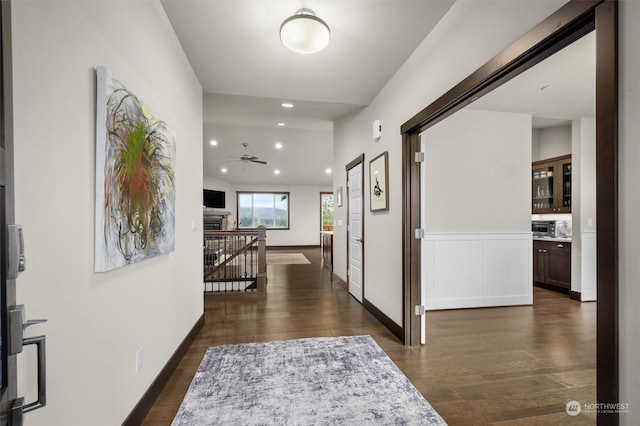 hallway featuring dark wood-type flooring