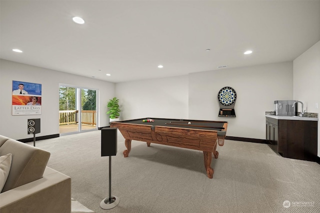 recreation room featuring light carpet, sink, and pool table