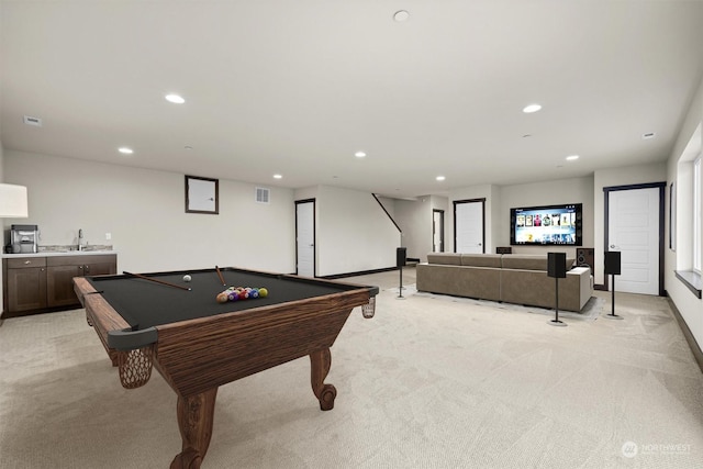 game room featuring indoor wet bar, light carpet, and pool table