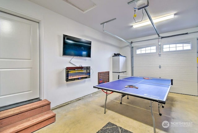 rec room featuring concrete flooring