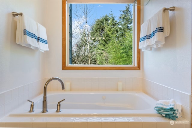 full bathroom with a garden tub