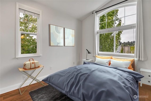 bedroom featuring dark hardwood / wood-style floors