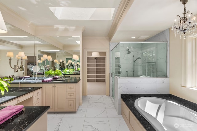 bathroom featuring a skylight, separate shower and tub, vanity, a chandelier, and crown molding