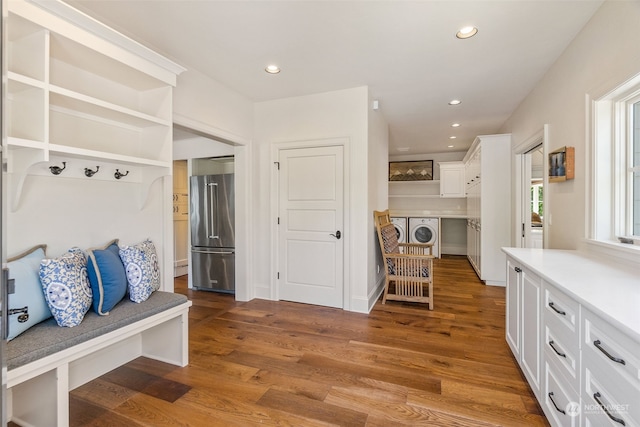 mudroom with wood-type flooring